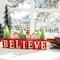 Glitzhome® 14" Christmas Believe House & Brush Trees Table Décor